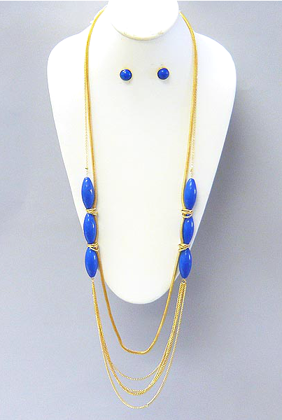 Mary <br> gold and blue necklace